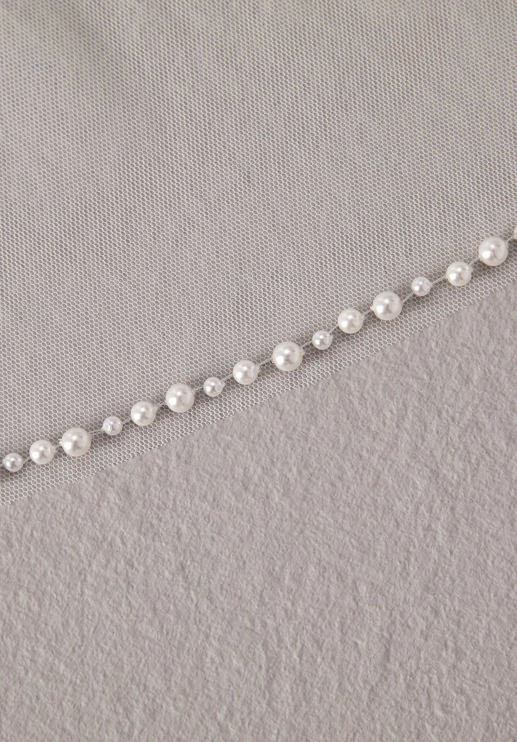 Fingertip Length Veils with Pearl Edging - Image 2